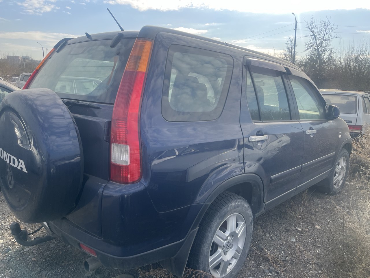 Транспортное средство марки «Honda C-RV», темно-синего цвета, 2004 г.в.,  с государственным регистрационным номером У542ВМ17. (ТС в залоге)